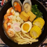Seafood Ramen · Topping :
Chopped Scallion, Corn, Mushroom, Fish Tofu, Naruto, & Seasoned Boiled Egg (1/2).
...