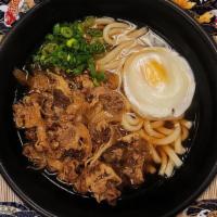 Beef Udon · Topping :
Chopped Scallion, Onion, Naruto & Poached Egg. 
Soup (12oz) :
Chicken Broth with U...
