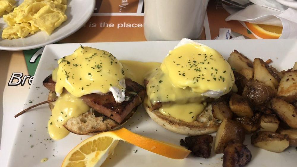 Ham Steak Benedict · English muffins topped with eggs, ham steak, and Hollandaise with side of home fries or baked beans.