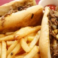 Philly Cheesesteak · With mayo, pickles, ketchup, onions and American cheese on a long roll with a side of fries.