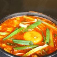 Soft Tofu Stew · Soft tofu, vegetables and your choice of seafood, pork or beef in a spicy soup; side of egg ...