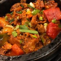 Stone Pot Spicy Pork Dupbap · Spicy. Rice topped with stir-fried spicy pork and vegetables in a hot stone pot.