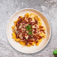 Don'T Break My Bbq Mac · Caramelized onions, bbq cheese sauce, and roasted spicy chicken cooked in a blend of creamy ...