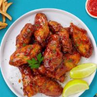 Sweet Cookout Bbq Wings  · Fresh chicken wings breaded, fried until golden brown, and tossed in honey and barbecue sauc...