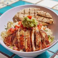 Chicken Fajita Salad · Half Fajita, half salad, 100% beautiful. Grilled chicken atop a bed of lettuce with beans, s...