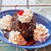 Fried Ice Cream · Sweet vanilla ice cream with a salty crushed pretzel shell, covered in chocolate sauce or ho...