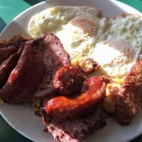 Irish Breakfast · 2 eggs, imported Irish bacon, sausage, white pudding.
