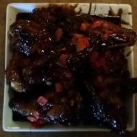 Saugus Wings · A favorite at our 1200 seat restaurant in Saugus. This is a sweet and garlic version of our ...