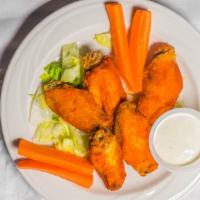Mediterranean Wild Wings · Chicken wings served with our house sauce.