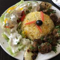Lamb Kabob · Tender delicate chunks of lamb marinated in our special herbs and spices. Served with rice a...