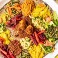 Habesha Special · Habesha combination split peas, lentil, spinach, cabbage, potato, green beans, and salad.