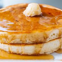 Pancakes (2 Pieces) · Vegetarian. Dusted with powdered sugar. Served with syrup.