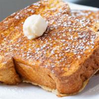 French Toast (2 Pieces) · Vegetarian. Dusted with powdered sugar. Served with syrup.