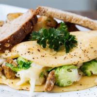 Vegan Omelet · Vegetarian, Vegan. Spinach, vegan sausage, and vegan cheese. Served with breakfast potatoes ...