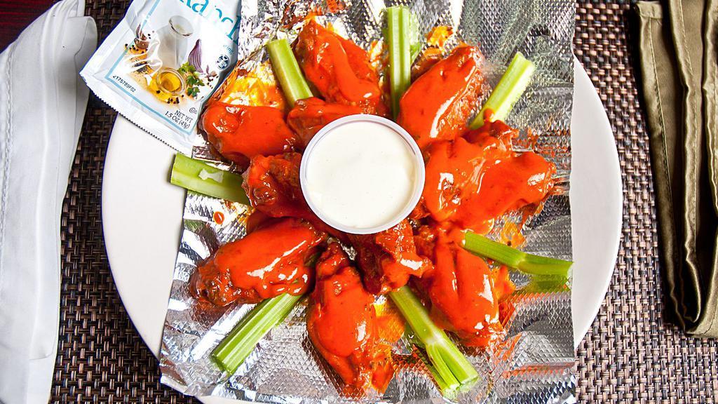 Buffalo Wings Platter (10) · Served with french fries and cole slaw.