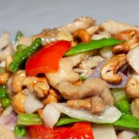Chicken With Cashew Nuts · Served with white rice.