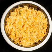 Chicken Biryani · Indian basmati rice cooked with boneless chicken, onions, fresh ginger, nuts, and delicate s...