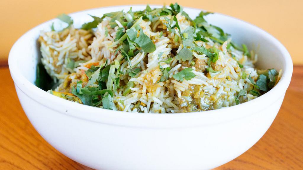Shere-E-Punjab Special Biryani · Chef’s own combination of authentic Indian spices, cooked with tender pieces of lamb, chicken, and fresh vegetables