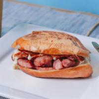 Portuguese · Linguiça, cheese & spicy mayo on a French bread toasted.