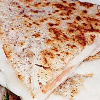 Cheese Quesadilla · Cheese and tomato on a wrap.
