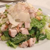 Grilled Chicken Caesar Salad · Seasoned grilled chicken, served over caesar salad.