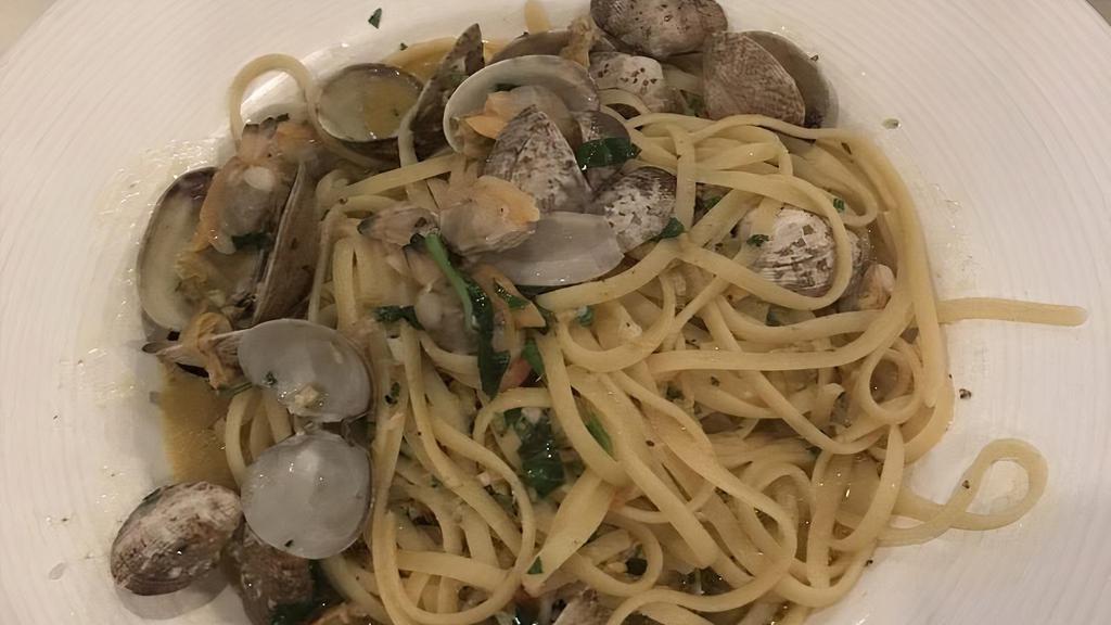 Linguini With Clams · Little neck clams sauteed in olive and garlic, over a bed of linguini, and finished in a red or white sauce.