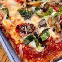 Garden Pizza · mozzarella, parmesan, roasted cherry tomatoes, roasted mushrooms, caramelized onions, basil