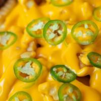 Cheese Fries · Topped with jalapeño slices. Try adding some meat!