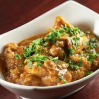 Chicken Curry · Boneless chicken cooked in thick curry sauce.