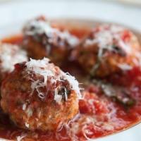 Meatball Appetizer · Housemade meatballs with marinara, Parmigiano Reggiano, and fresh basil, served with fresh f...