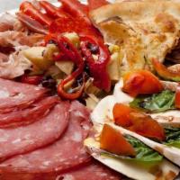 Antipasto · An assorted mix of Italian meats, cheeses & marinated vegetables, served with fresh baked fo...