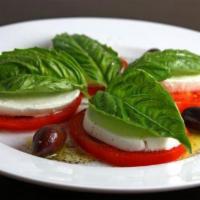 Caprese Salad · Fresh mozzarella, vine-ripened tomatoes, fresh basil, & salt drizzled with balsamic and extr...