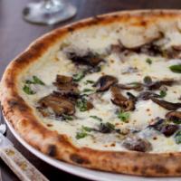 Toscana Pizza · Garlic cream sauce, mushrooms, house mozzarella, rosemary, Parmigiano Reggiano, oregano, and...