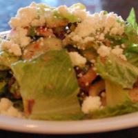 Greek Salad · Crisp romaine lettuce with Feta cheese, tomato, cucumbers, green peppers, olives, & red onio...