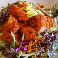 Crispy Buffalo Chicken Salad · Romaine, tomato, red onion, carrots, red. cabbage, cucumber & crispy chicken with. buffalo s...