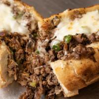 Steak & Cheese · Shaved beef, seasoned and grilled and topped with cheese and toasted,