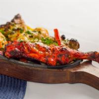 Tandoori Mixed Kabob · Gluten free. Mixed platter of beef, shrimp, variety of chicken served on sizzler with onions...