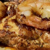 Blackened Chicken & Jumbo Shrimp · Bone-in Chicken Breast | Jumbo Shrimp | Creole Mustard Sauce | Saffron Rice | Roasted Veggies