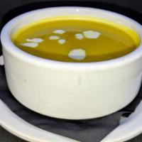 Curried Butternut Squash Soup (Gf,V). · Roasted Butternut Squash / Curry / Ginger / Lemon / Coconut