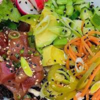 Tuna Poke Bowl · Pickled vegetables, sesame aioli, avocado, black rice.