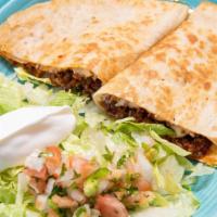 Chorizo Quesadilla · A delicious flour tortilla filled with tasty chorizo (Mexican sausage), beans, and cheese, g...