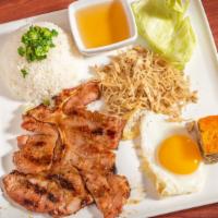 Com Tam Dac Biet Platter · Broken rice with grilled pork chops, omelet egg, shredded pork skin, and steamed egg meatloaf.