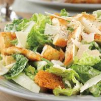 Original Caesar Salad · Crisp romaine lettuce tossed with dressing croutons and Parmesan cheese.