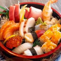 Sushi And  Sashimi Combo Dinner · Chef's choice of 6 pcs nigiri sushi, 8 pcs sashimi, 4 pcs California roll.