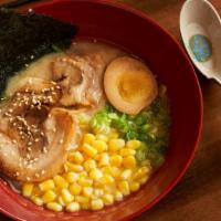 Miso Ramen* · Tender chashu pork served with house miso broth topped with seasoned egg, corn, scallion, se...