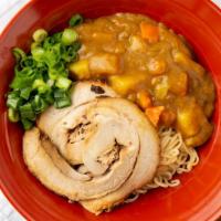 Curry Ramen · Tender chashu pork served with Japanese curry topped with diced carrots, diced potatoes, and...