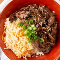 Beef Teriyaki Rice Bowl · Pan-fried seasoned beef over jasmine rice served with house teriyaki sauce topped with seaso...