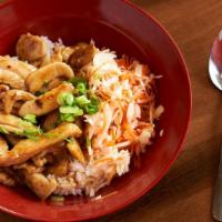 Chicken Teriyaki Rice · Pan-fried seasoned chicken over jasmine rice served with house teriyaki sauce topped with se...