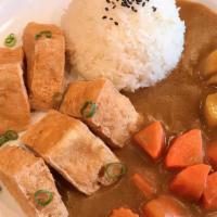 Tofu Curry Rice · Vegetarian. Steamed and fried tofu over jasmine rice served with Japanese curry topped with ...
