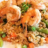 House Fried Rice · Fried rice with meat pan-fried with house sauce, egg, garlic, onion, carrot, peas and topped...